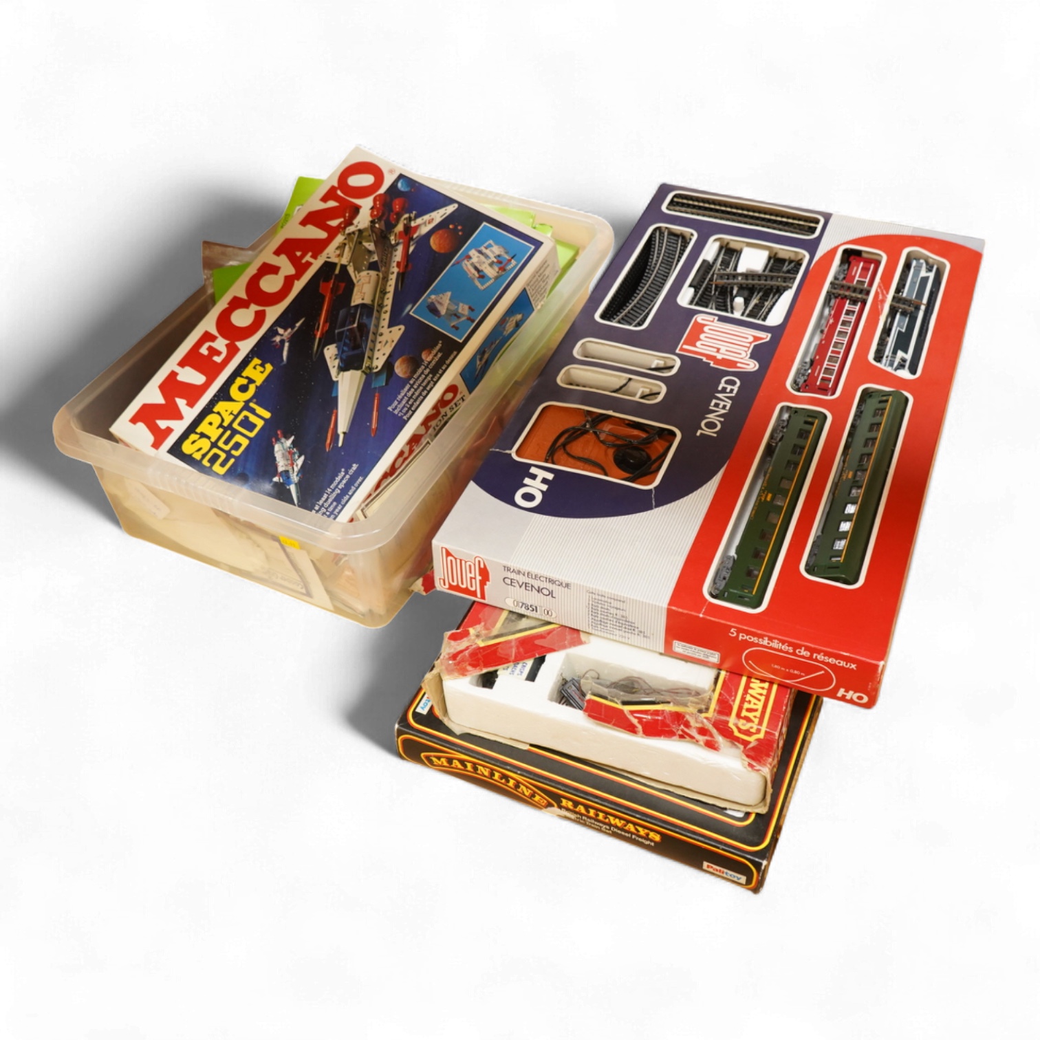 A collection of 00 gauge model railway, including three box train sets by Jouef, Mainline and Hornby, together with a large selection of unconstructed railway related plastic and metal kits and accessories, manufacturers